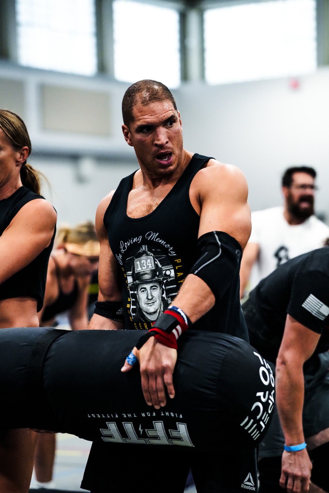 "The 4-Person Worm at Fight for the Fittest, strengthening athlete bonds and pushing the limits of functional strength in a competitive environment.