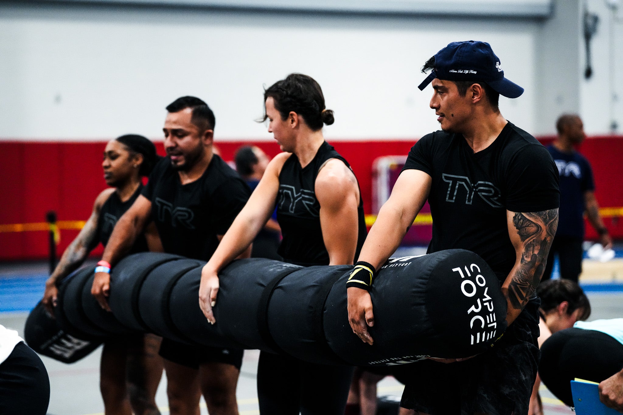 "The 4-Person Worm at Fight for the Fittest, helping teams improve coordination and strength for tackling challenging events."