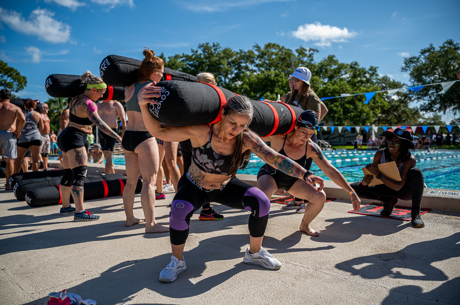 "Gym members preparing for Wod-Wars using the compact yet powerful 2-Person Worm during intense team training sessions."
