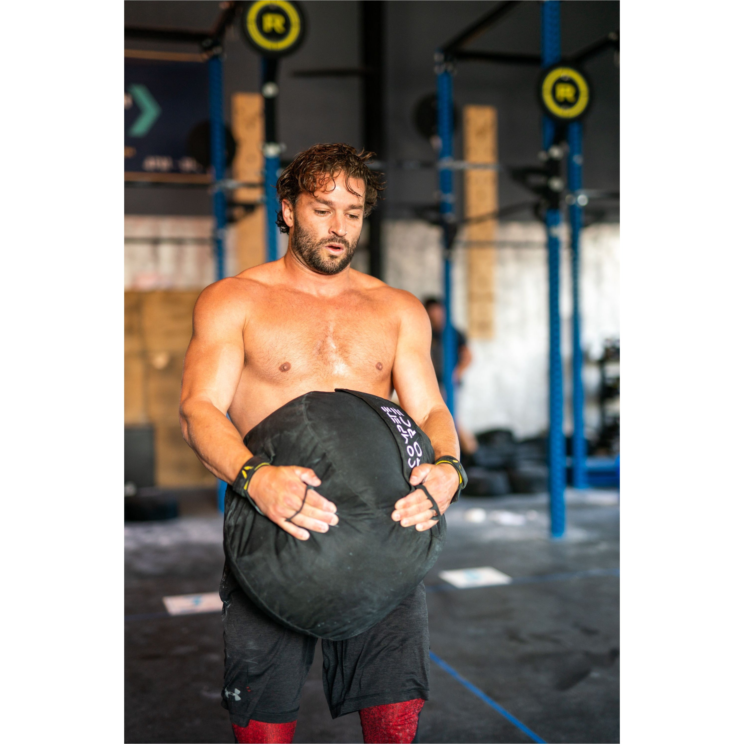 "Compete Force Strongman Bag – Designed for Summit Games, this durable fitness sandbag activates stabilizers for improved balance and core strength."