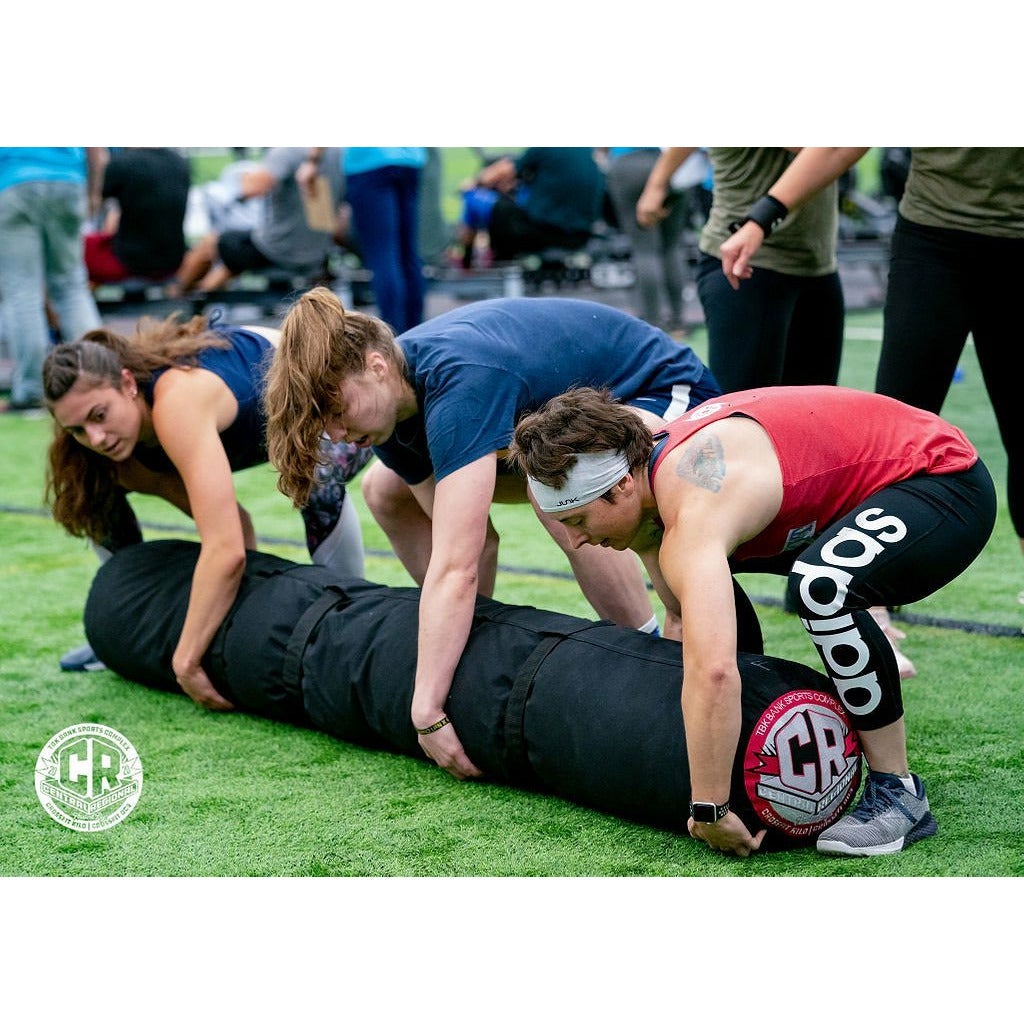 "Competing with the 150lb 3-Person Female/Scaled Worm at KointheOK, increasing teamwork and functional strength through dynamic exercises."
