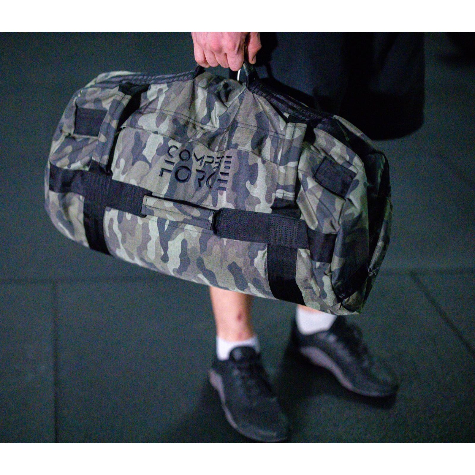 "Military personnel training with Compete Force Utility Bags, enhancing resilience, teamwork, and operational readiness through dynamic workouts."